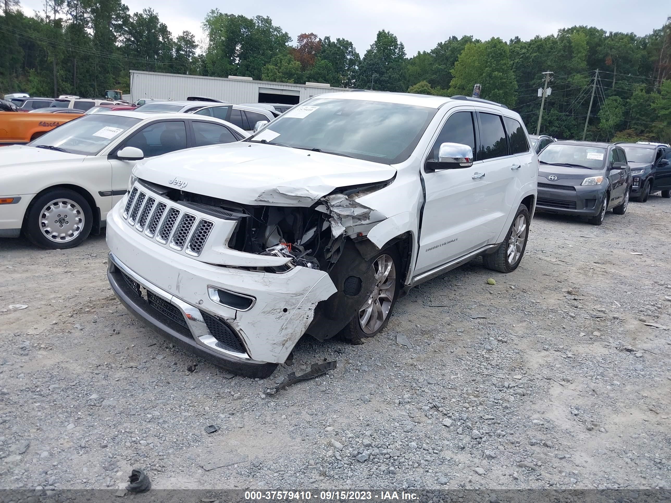 Photo 1 VIN: 1C4RJEJT4EC377947 - JEEP GRAND CHEROKEE 