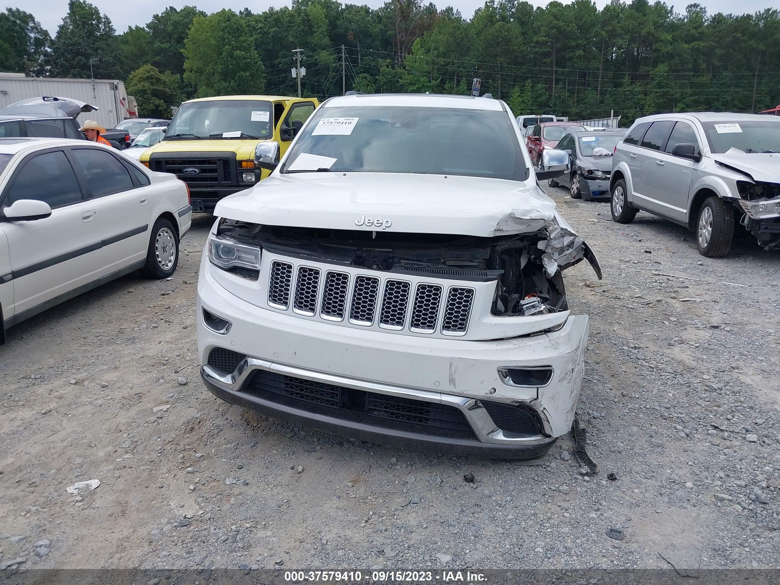 Photo 11 VIN: 1C4RJEJT4EC377947 - JEEP GRAND CHEROKEE 