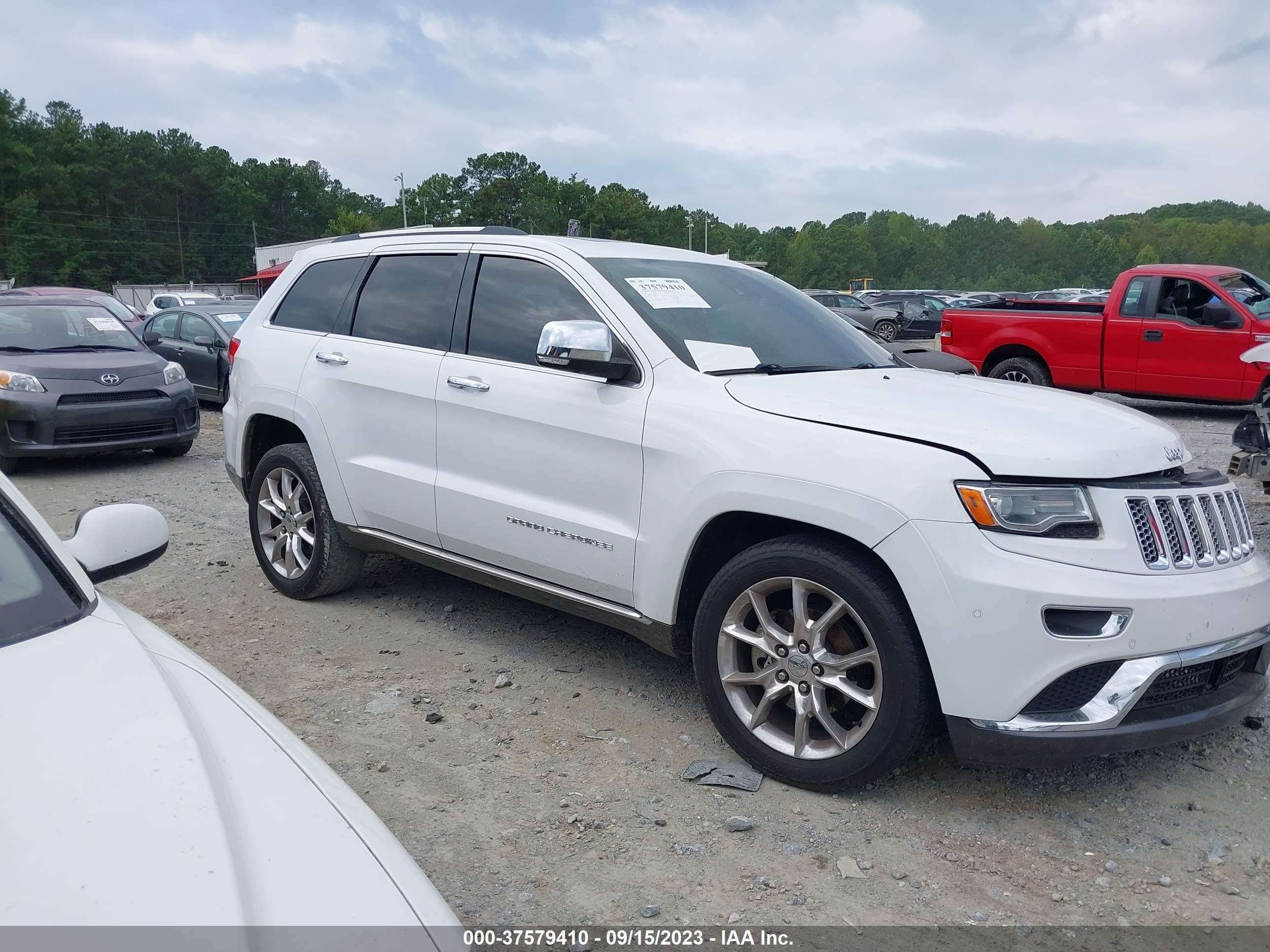 Photo 12 VIN: 1C4RJEJT4EC377947 - JEEP GRAND CHEROKEE 