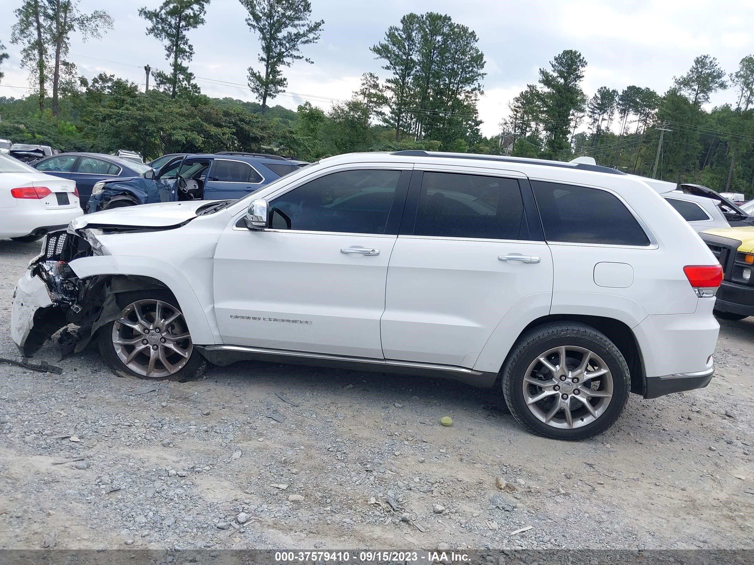 Photo 13 VIN: 1C4RJEJT4EC377947 - JEEP GRAND CHEROKEE 