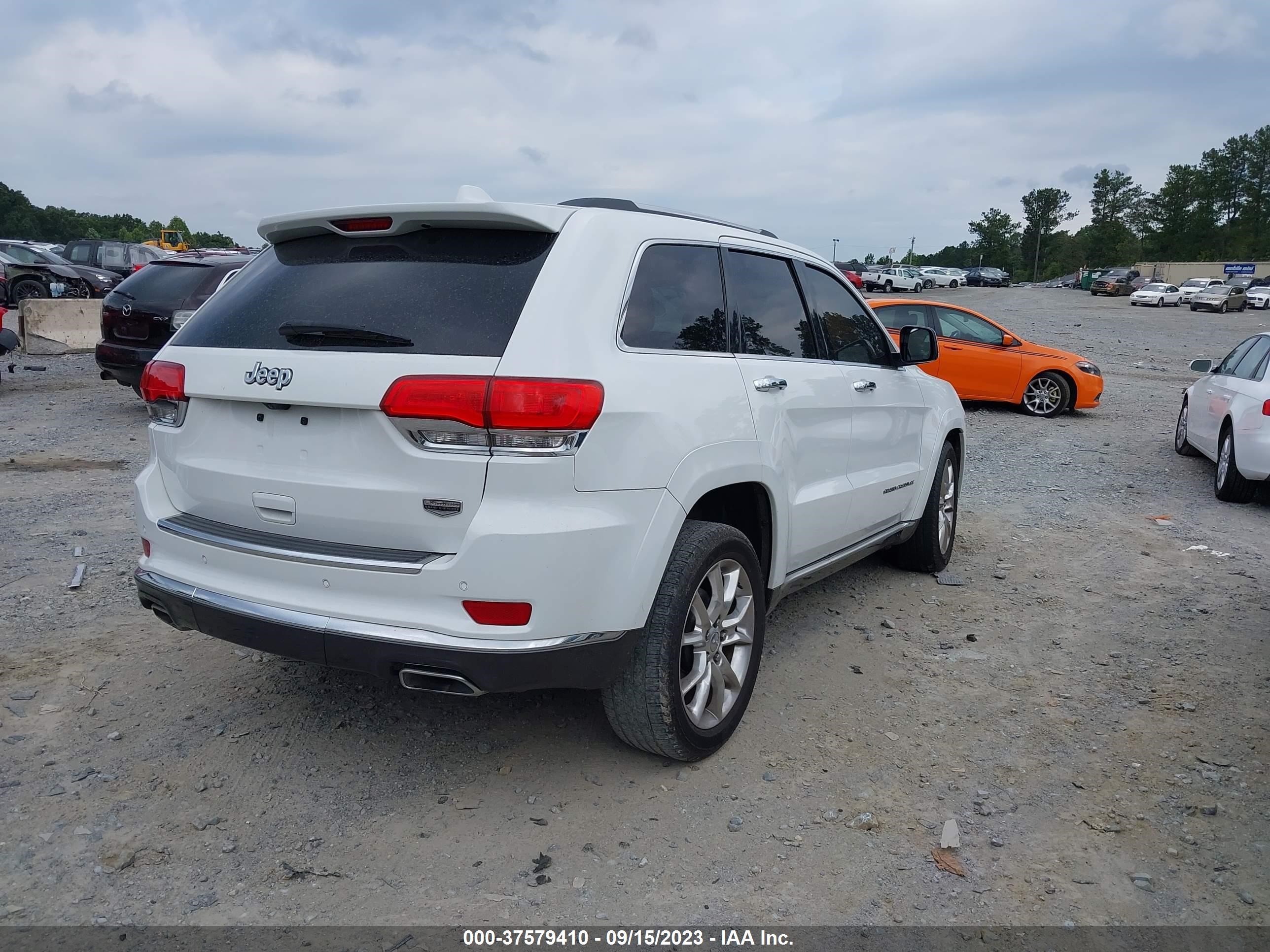 Photo 3 VIN: 1C4RJEJT4EC377947 - JEEP GRAND CHEROKEE 