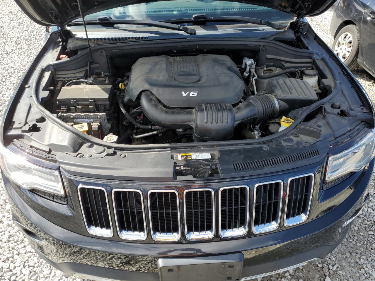 Photo 11 VIN: 1C4RJFBG3EC324955 - JEEP GRAND CHEROKEE 