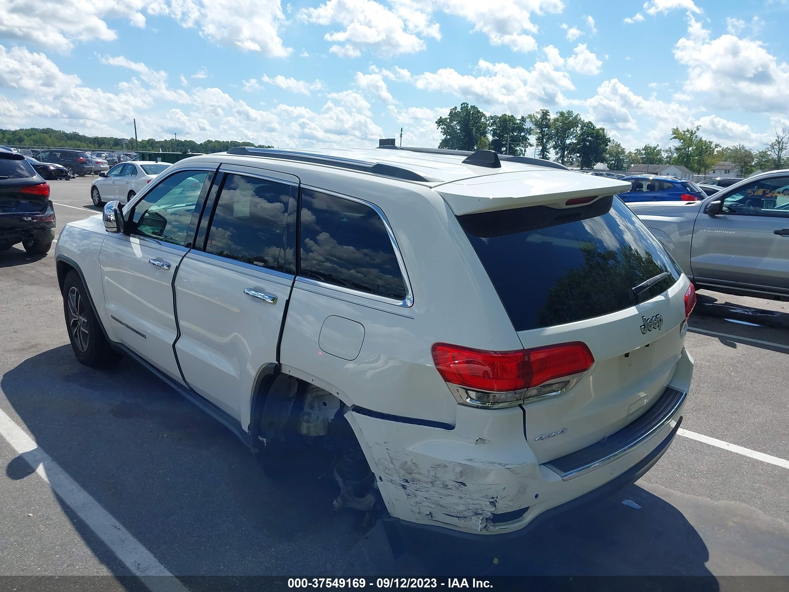 Photo 2 VIN: 1C4RJFBGXKC703866 - JEEP GRAND CHEROKEE 