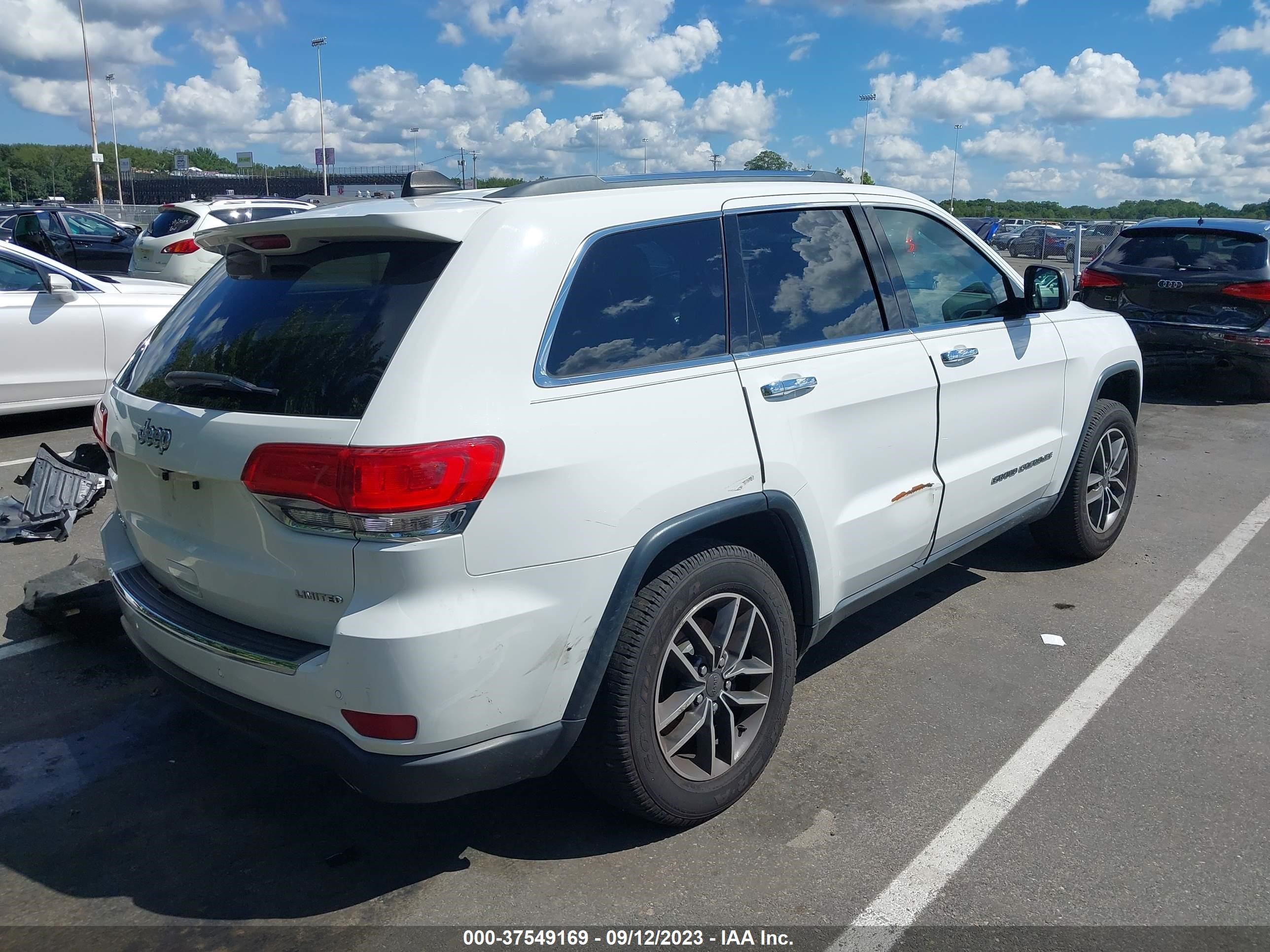 Photo 3 VIN: 1C4RJFBGXKC703866 - JEEP GRAND CHEROKEE 