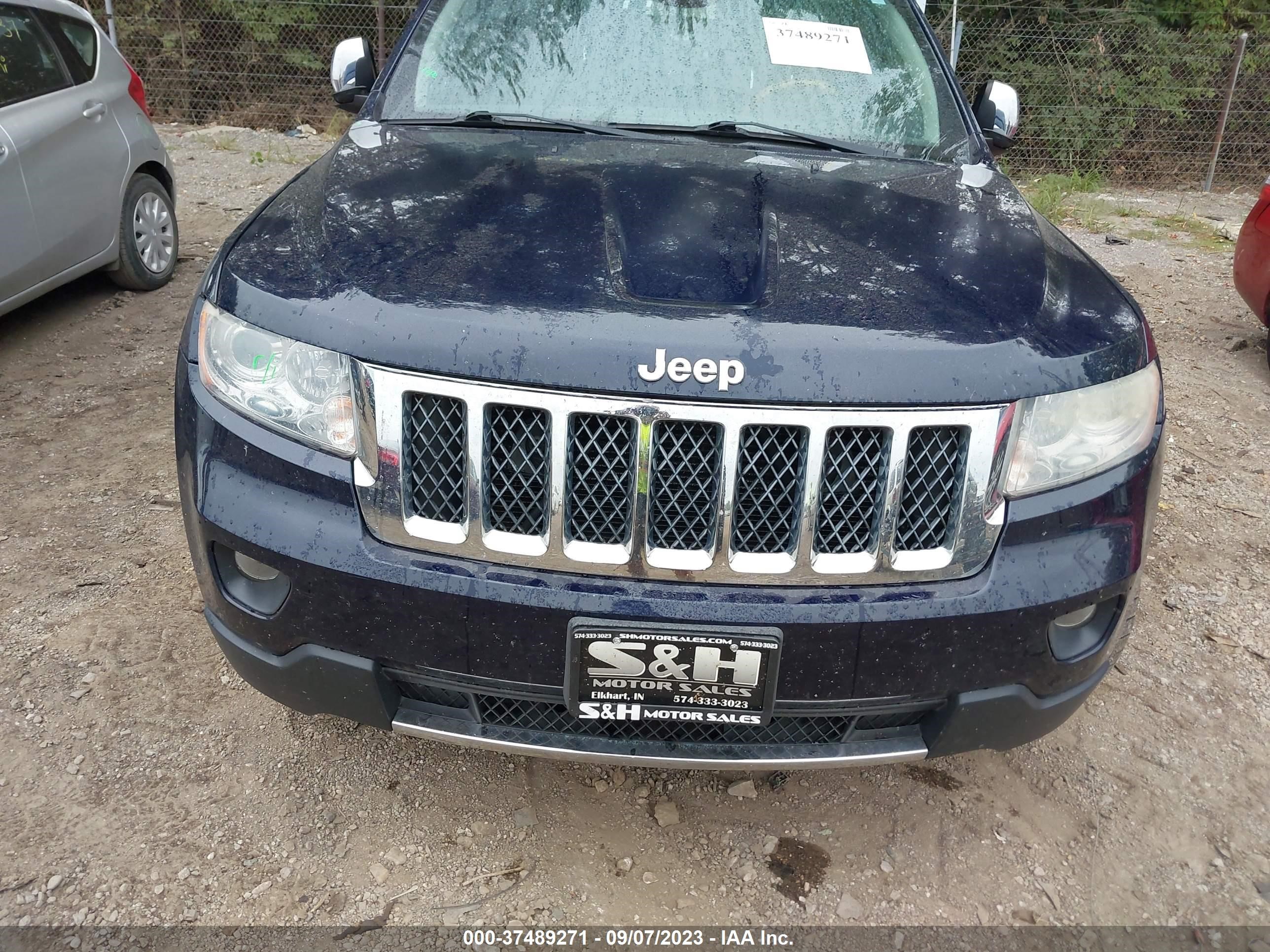 Photo 11 VIN: 1C4RJFCG5CC174942 - JEEP GRAND CHEROKEE 