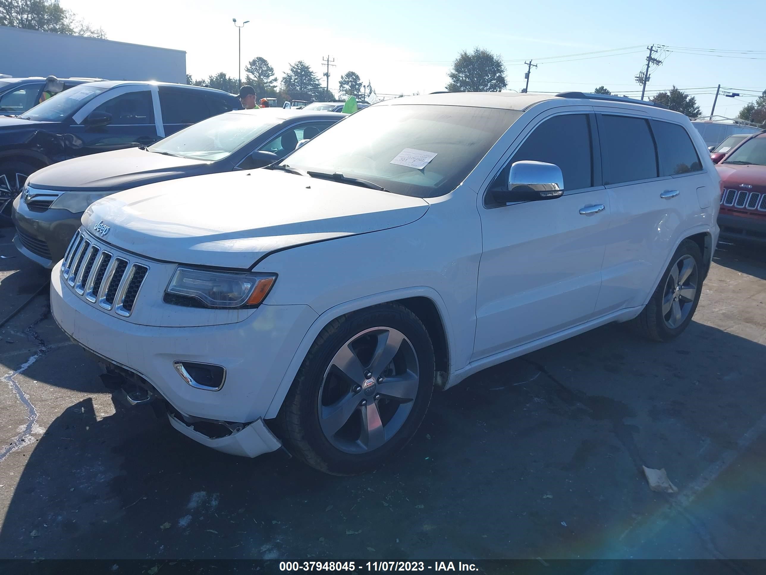 Photo 1 VIN: 1C4RJFCG6EC303211 - JEEP GRAND CHEROKEE 