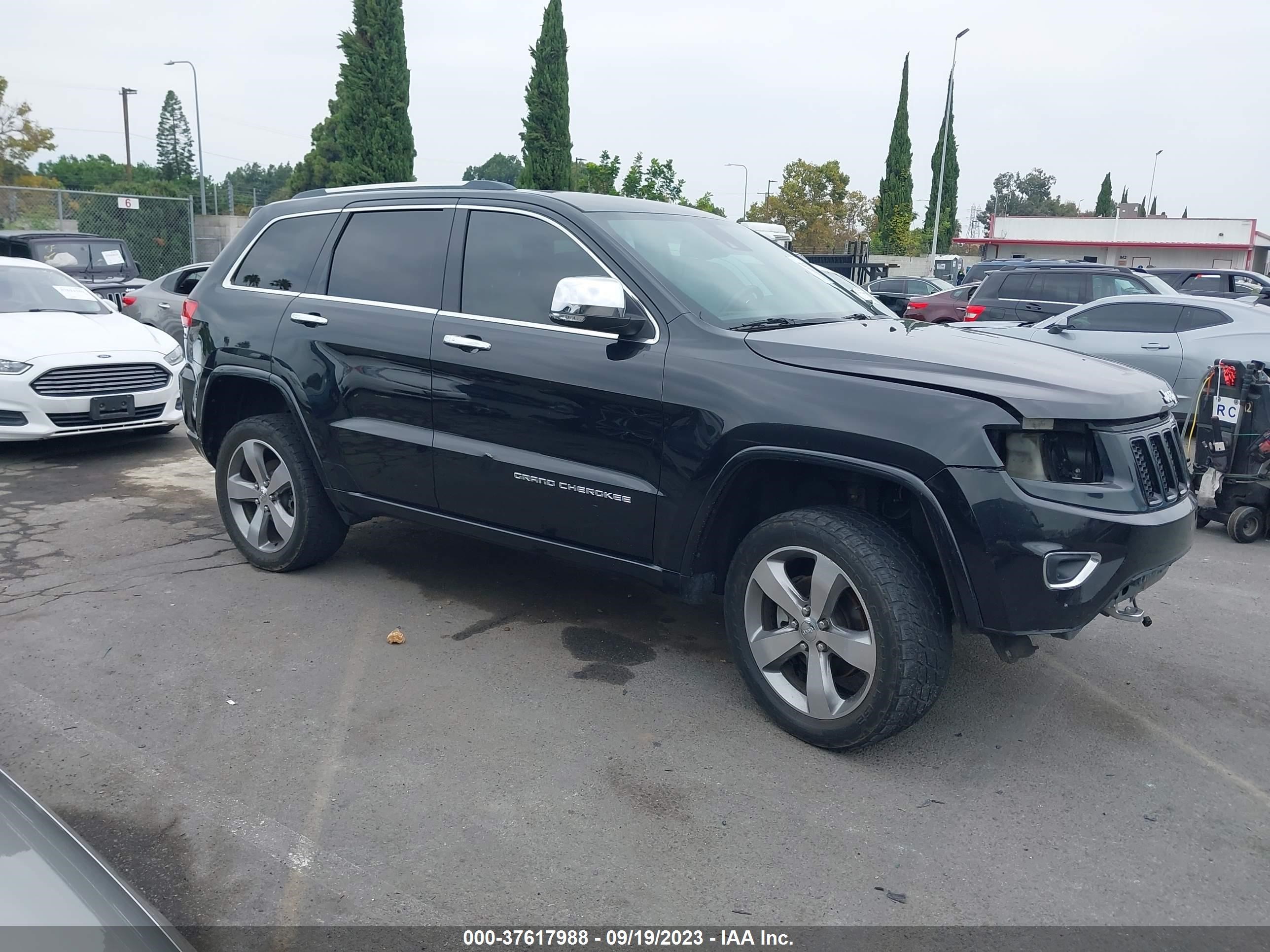 Photo 13 VIN: 1C4RJFCGXEC122340 - JEEP GRAND CHEROKEE 