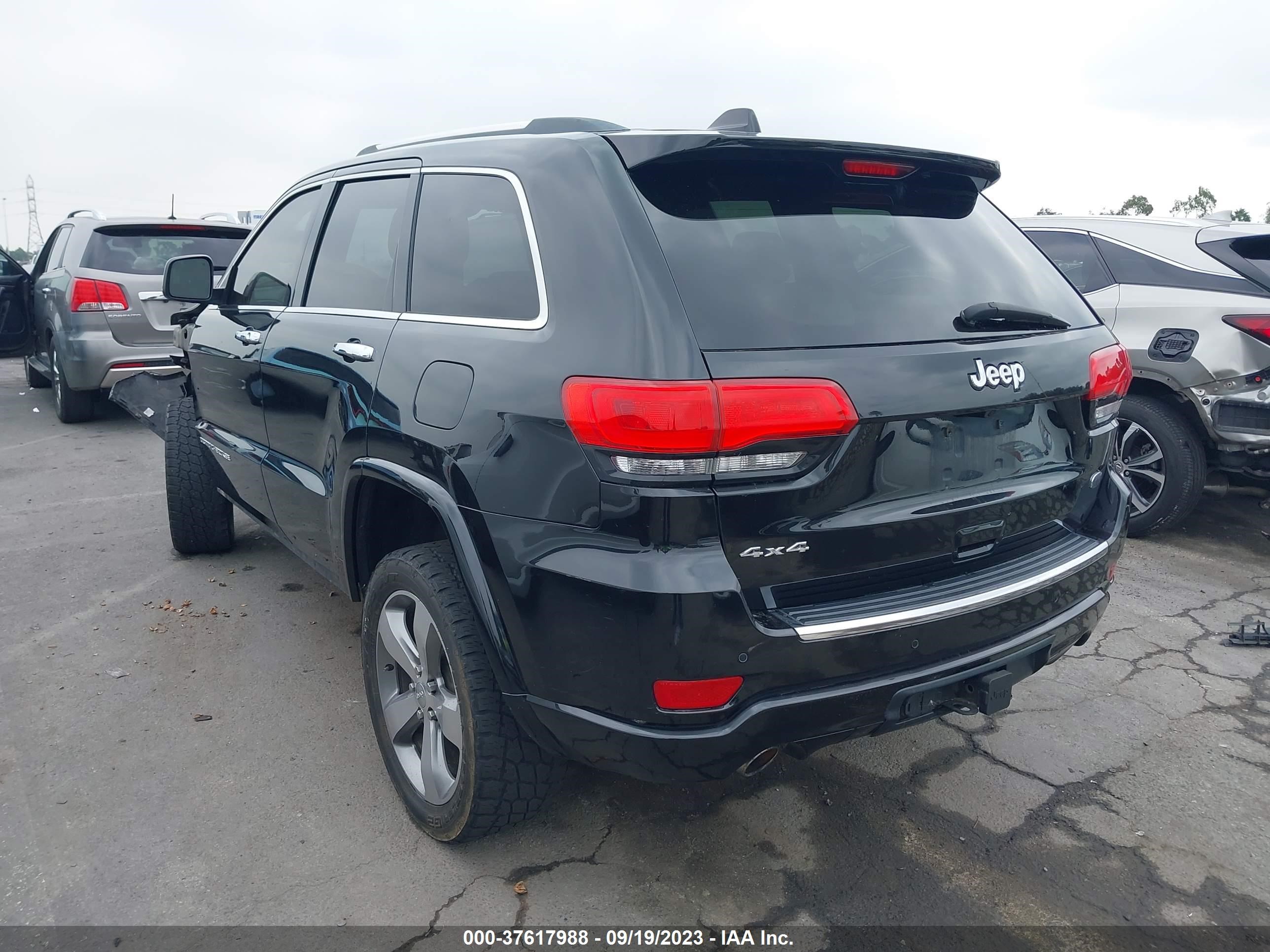 Photo 2 VIN: 1C4RJFCGXEC122340 - JEEP GRAND CHEROKEE 