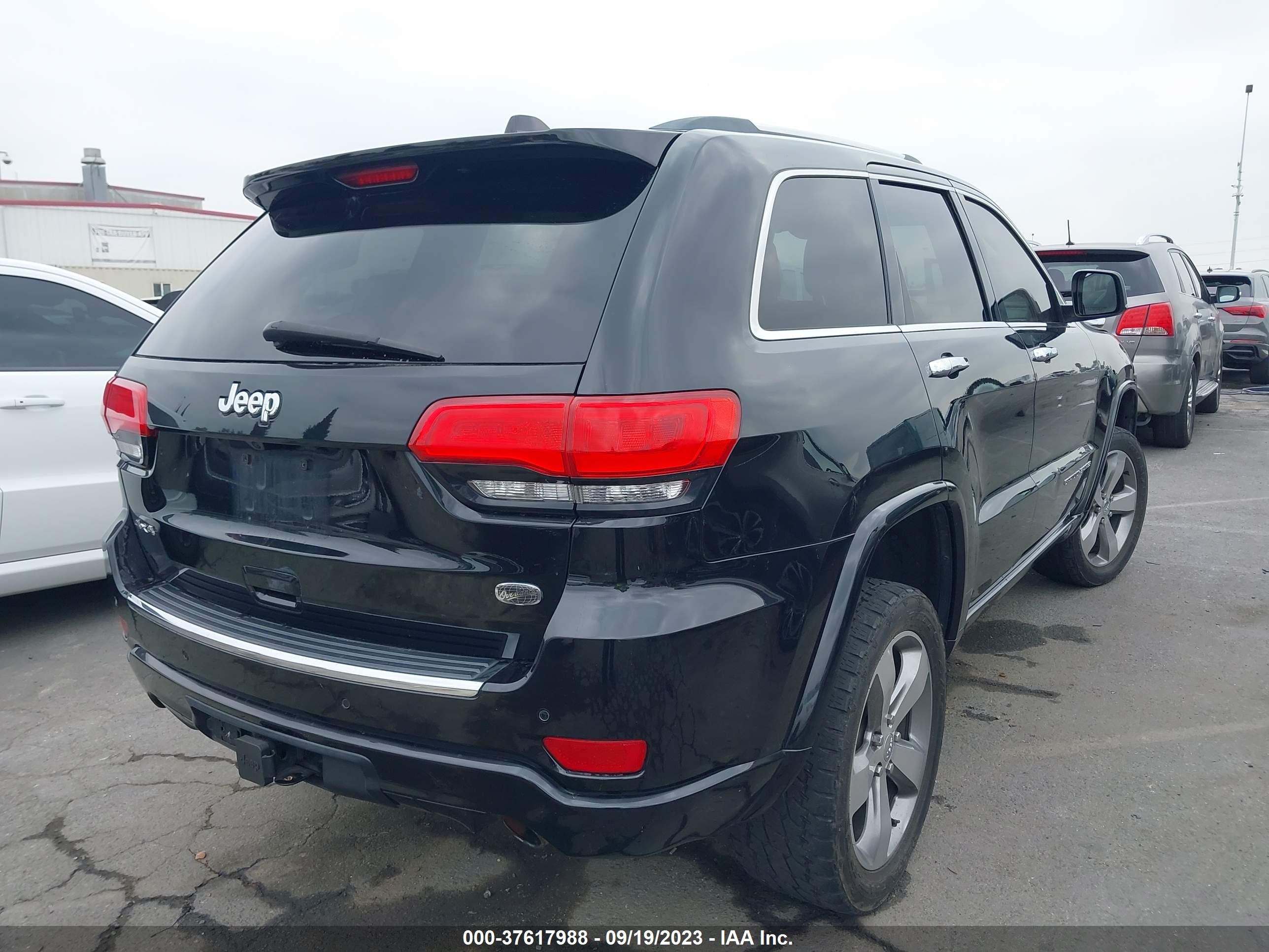 Photo 3 VIN: 1C4RJFCGXEC122340 - JEEP GRAND CHEROKEE 