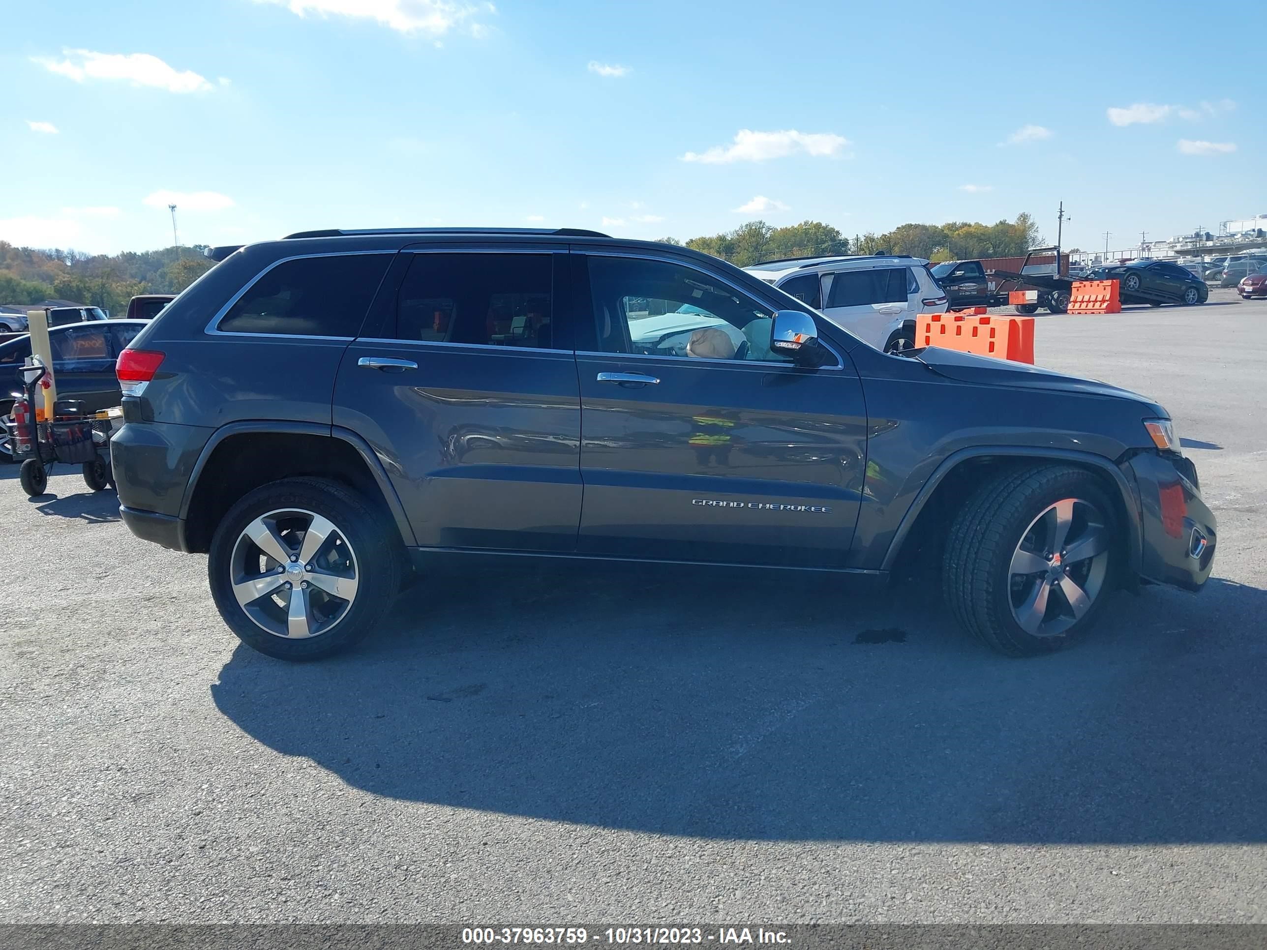 Photo 12 VIN: 1C4RJFCT4EC396145 - JEEP GRAND CHEROKEE 