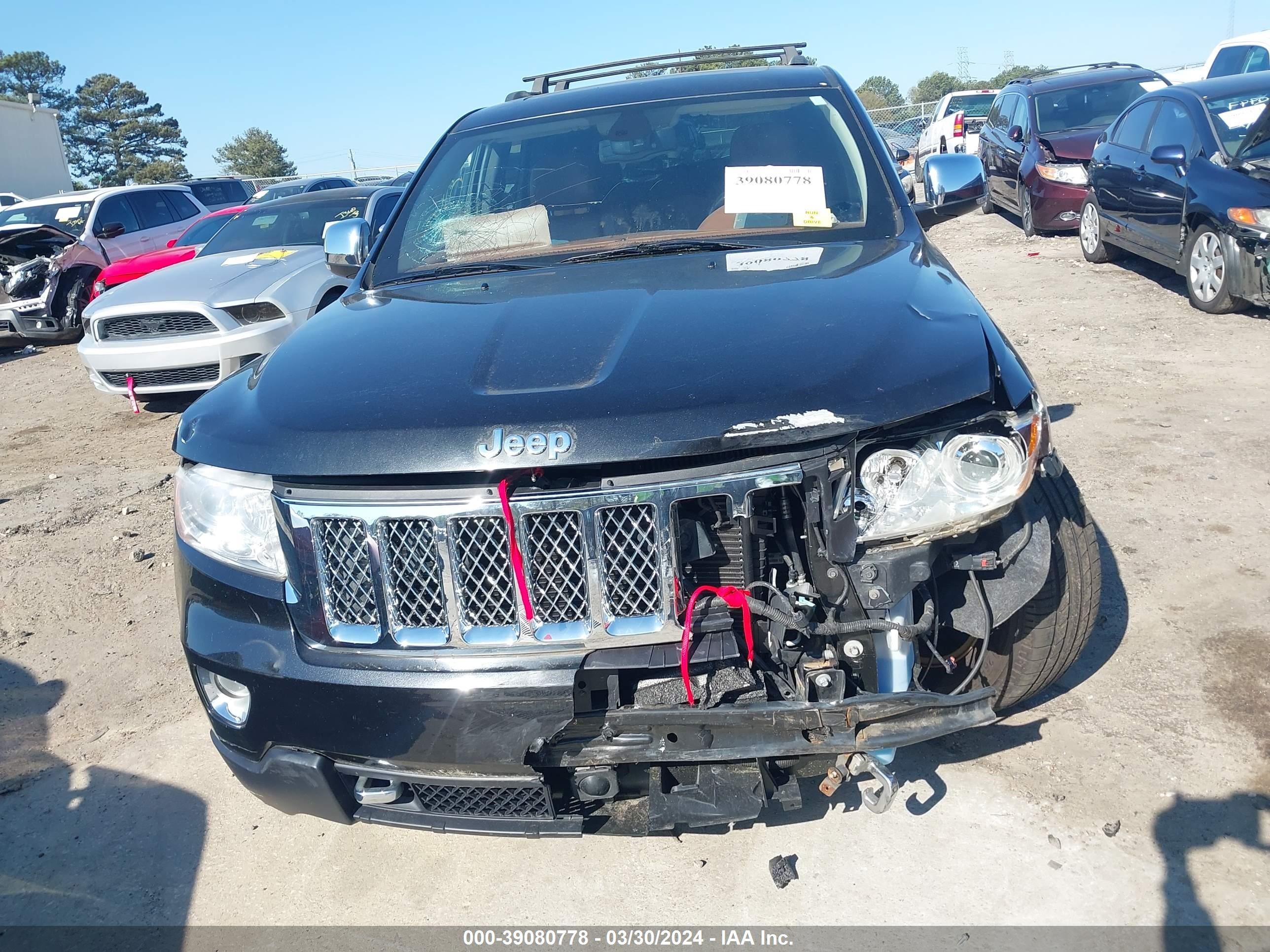 Photo 11 VIN: 1C4RJFCT7CC281150 - JEEP GRAND CHEROKEE 