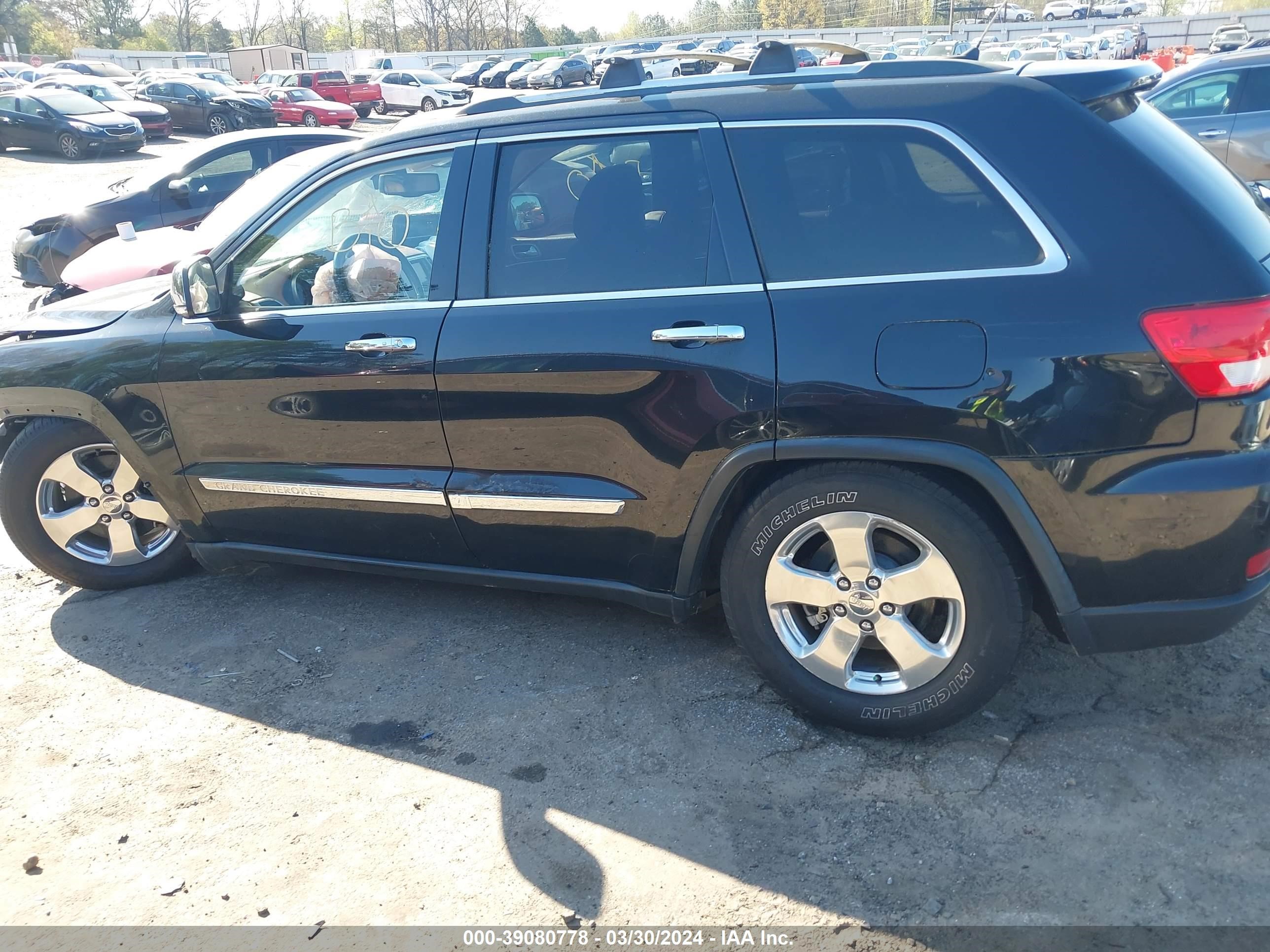 Photo 13 VIN: 1C4RJFCT7CC281150 - JEEP GRAND CHEROKEE 