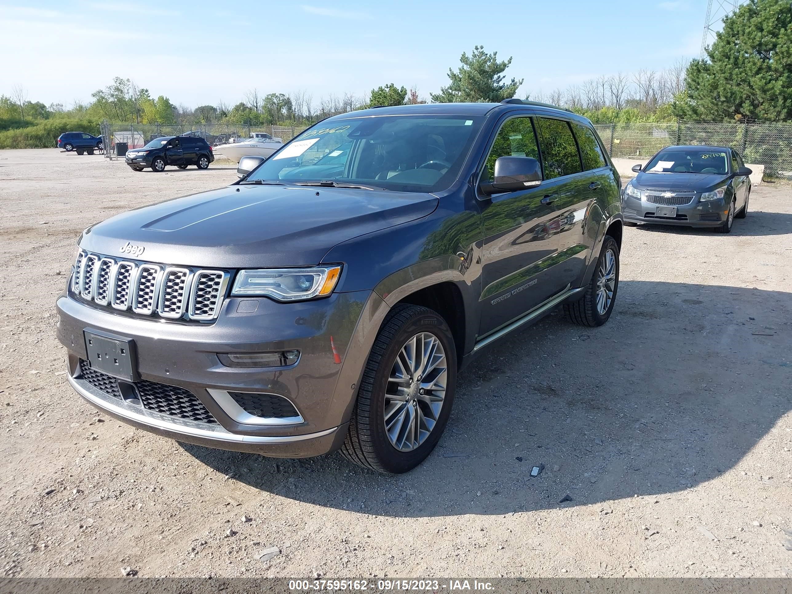 Photo 1 VIN: 1C4RJFJGXJC350285 - JEEP GRAND CHEROKEE 