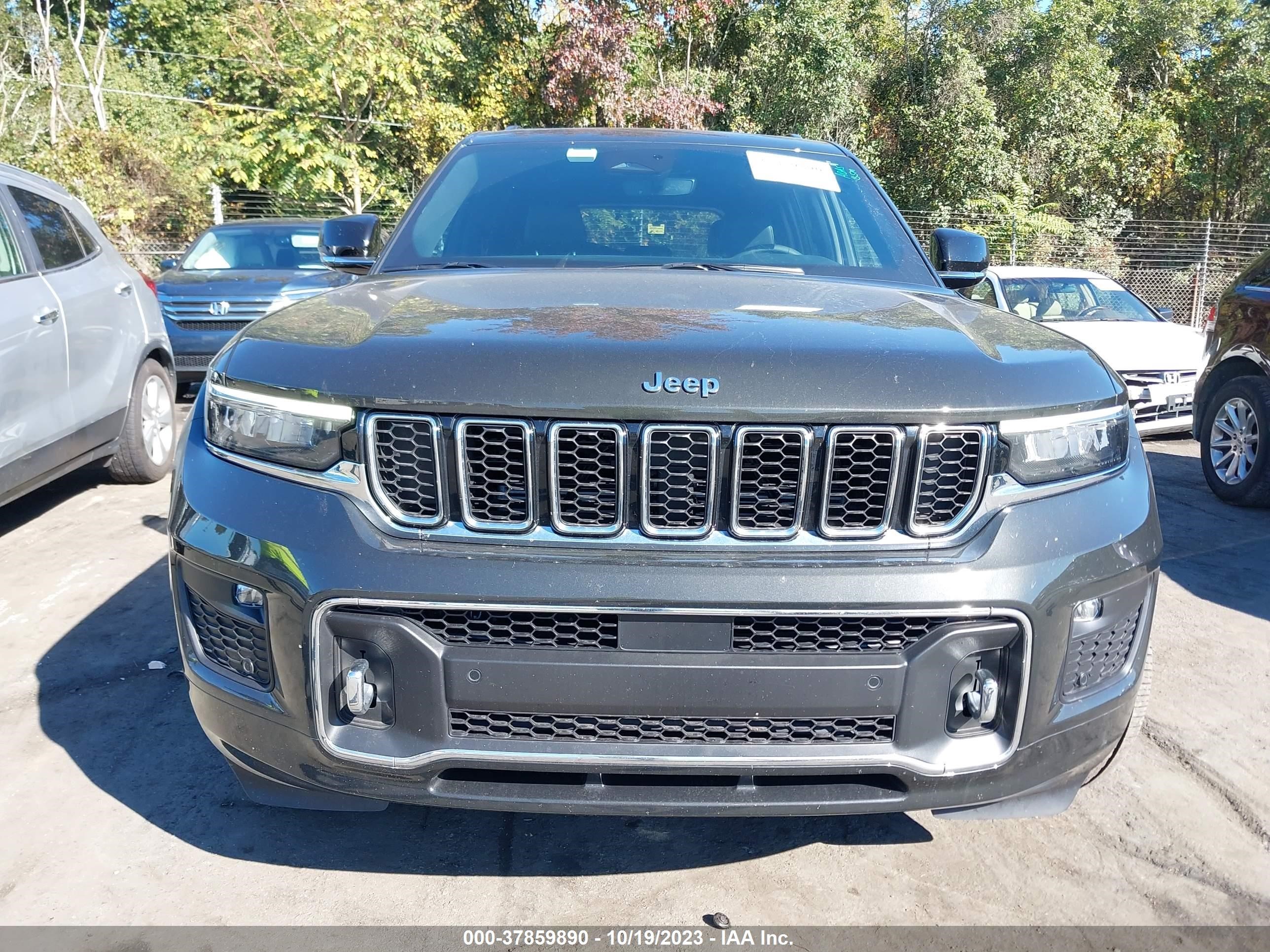 Photo 11 VIN: 1C4RJKDT3P8712891 - JEEP GRAND CHEROKEE 