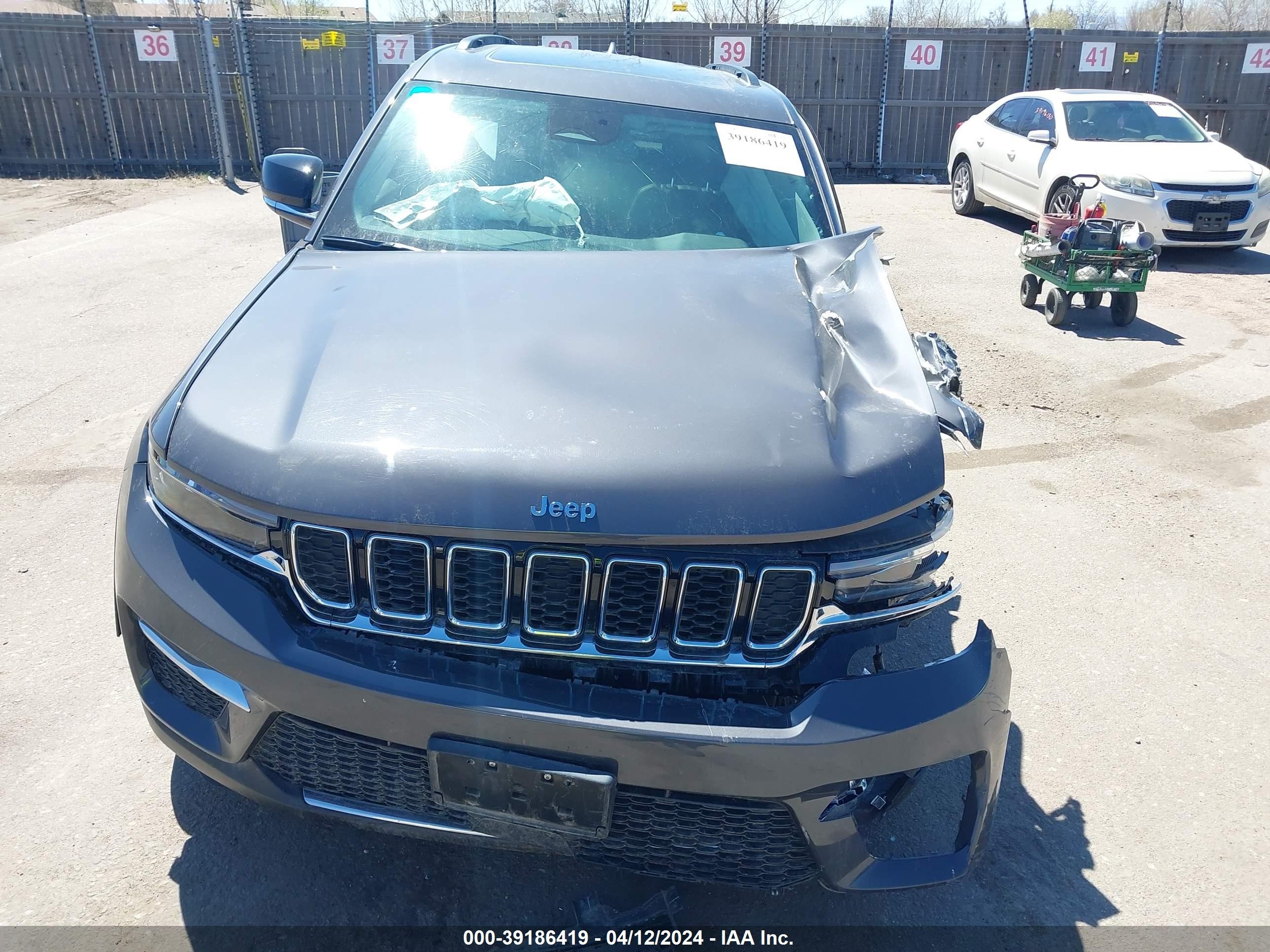 Photo 11 VIN: 1C4RJYB63R8959024 - JEEP GRAND CHEROKEE 