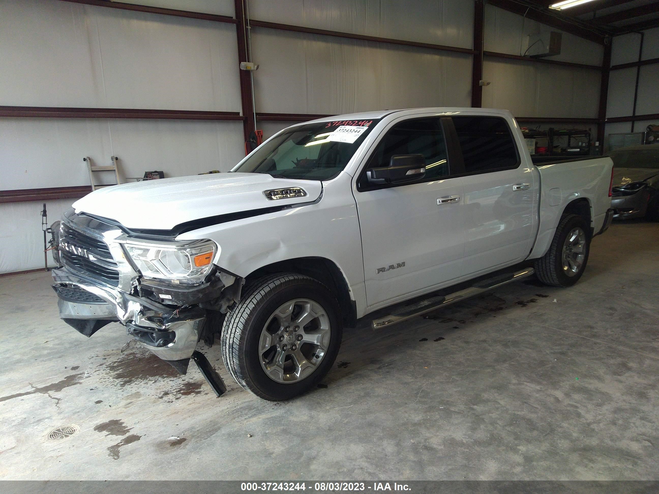 Photo 1 VIN: 1C6SRFFT5KN703030 - RAM 1500 