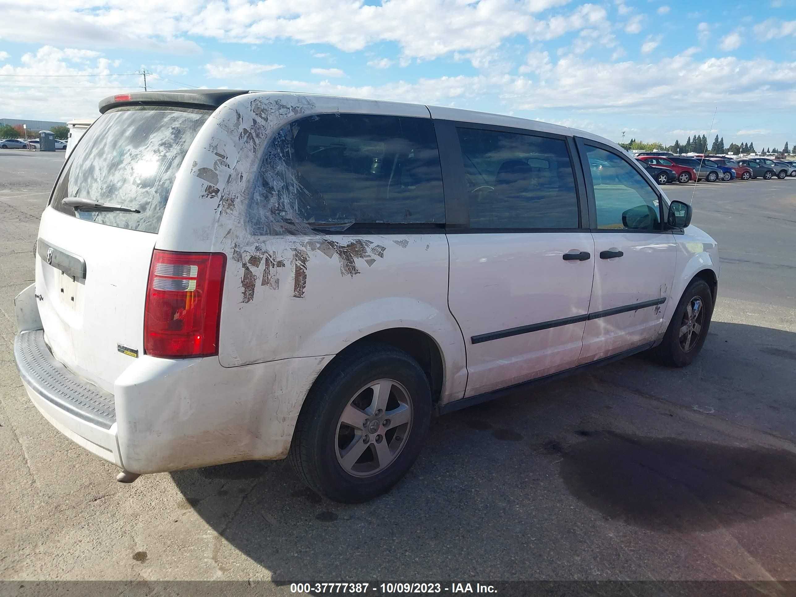 Photo 3 VIN: 1D4HN11HX8B184543 - DODGE CARAVAN 