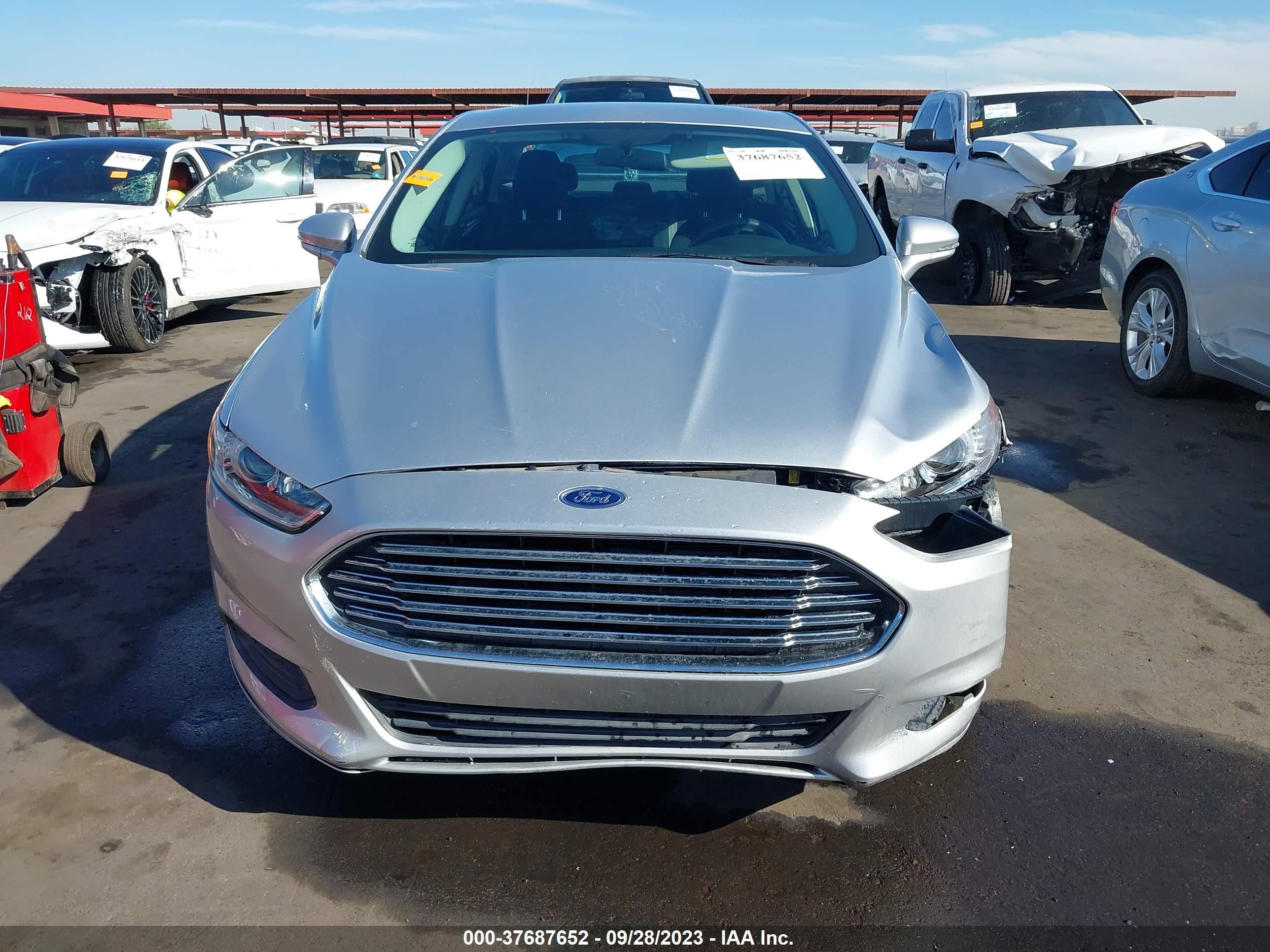 Photo 11 VIN: 1FA6P0H71E5360997 - FORD FUSION 