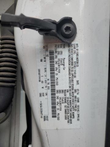 Photo 11 VIN: 1FADP3E20GL354785 - FORD FOCUS 