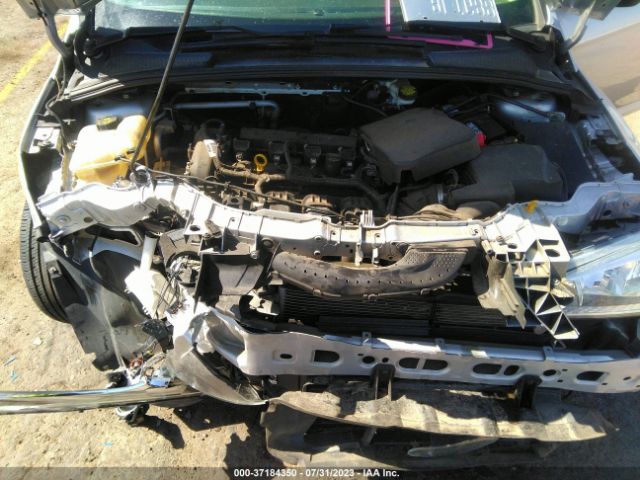 Photo 9 VIN: 1FADP3E20GL369979 - FORD FOCUS 