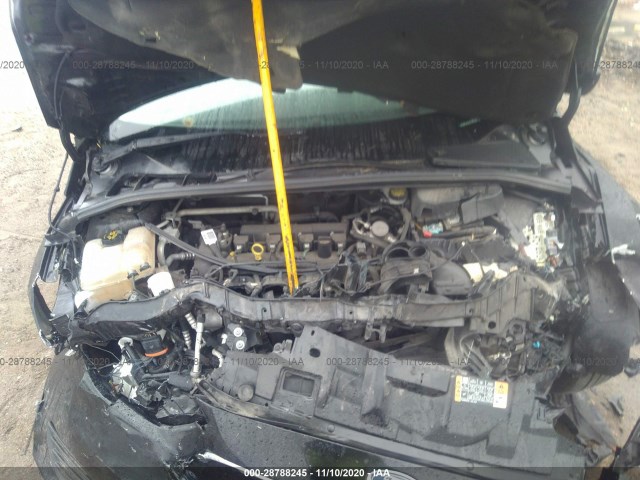 Photo 9 VIN: 1FADP3E20GL395160 - FORD FOCUS 