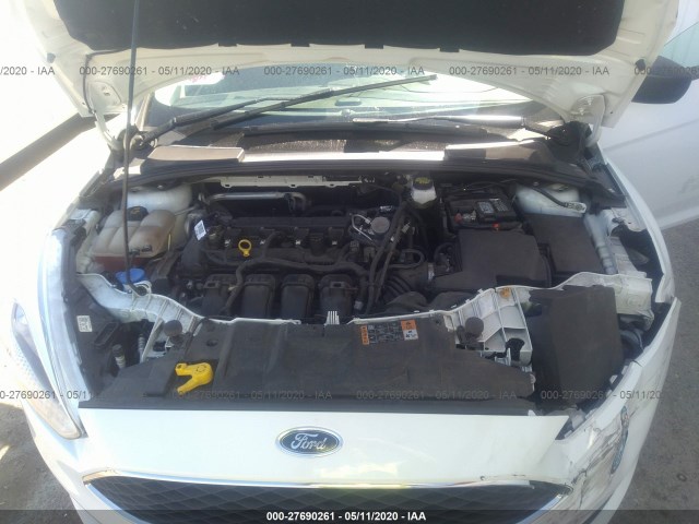 Photo 9 VIN: 1FADP3E20JL204909 - FORD FOCUS 