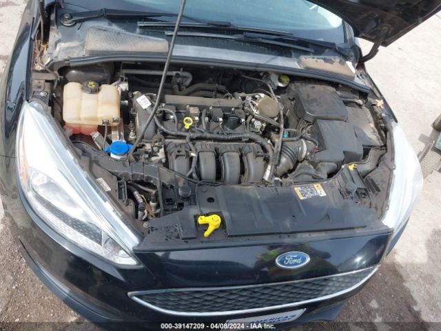 Photo 9 VIN: 1FADP3E21GL225261 - FORD FOCUS 