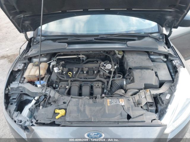 Photo 9 VIN: 1FADP3E21GL381607 - FORD FOCUS 