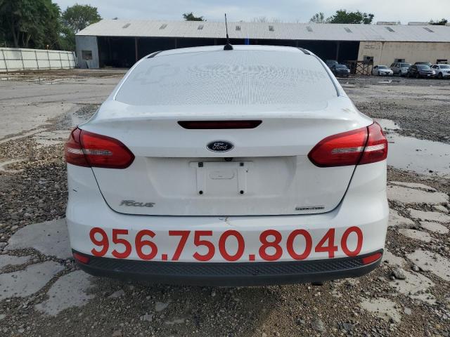 Photo 5 VIN: 1FADP3E21GL391361 - FORD FOCUS 