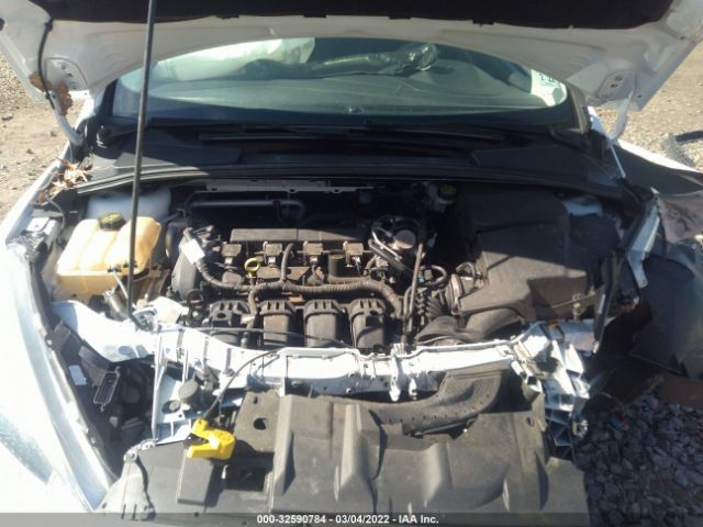 Photo 9 VIN: 1FADP3E21GL401192 - FORD FOCUS 