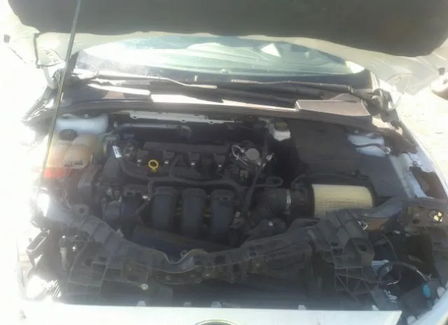 Photo 9 VIN: 1FADP3E21JL230953 - FORD FOCUS 