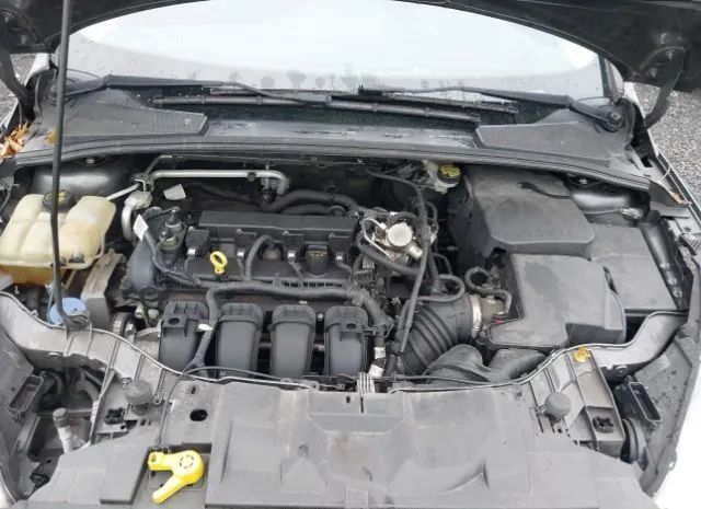 Photo 9 VIN: 1FADP3E22GL385911 - FORD FOCUS 