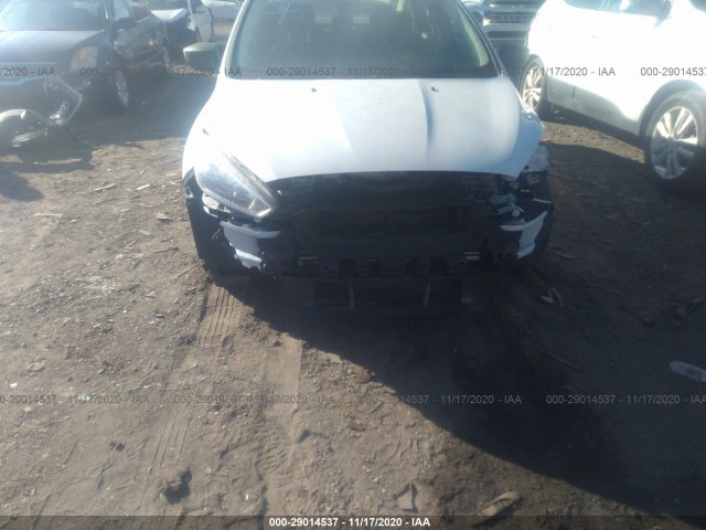 Photo 5 VIN: 1FADP3E22HL337181 - FORD FOCUS 