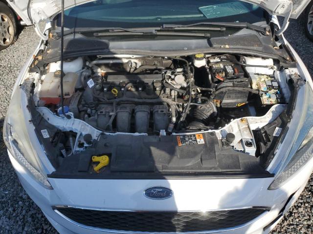 Photo 10 VIN: 1FADP3E22JL209402 - FORD FOCUS S 