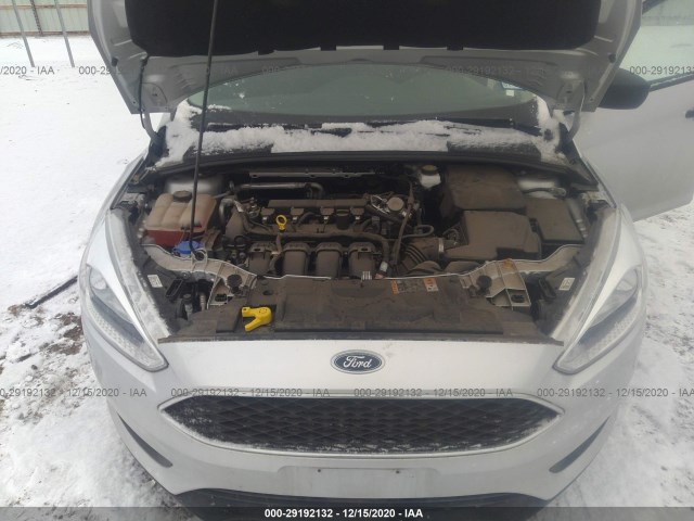 Photo 9 VIN: 1FADP3E22JL321536 - FORD FOCUS 