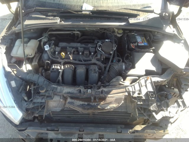 Photo 9 VIN: 1FADP3E23GL207330 - FORD FOCUS 