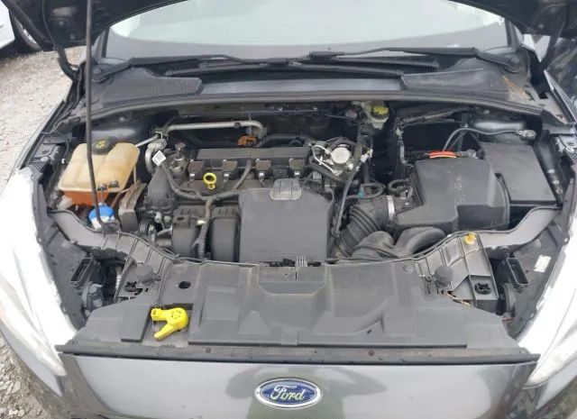 Photo 9 VIN: 1FADP3E23GL355705 - FORD FOCUS 