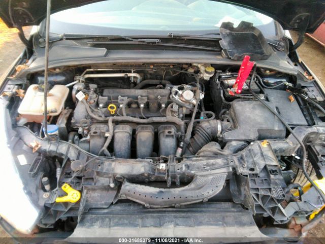 Photo 9 VIN: 1FADP3E24GL331252 - FORD FOCUS 