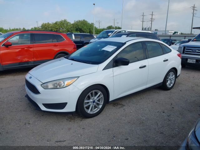 Photo 1 VIN: 1FADP3E24GL404720 - FORD FOCUS 