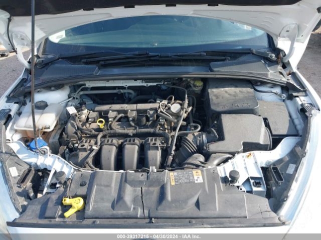 Photo 9 VIN: 1FADP3E24GL404720 - FORD FOCUS 