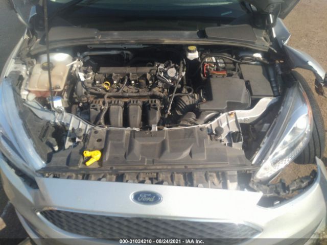 Photo 9 VIN: 1FADP3E24JL220286 - FORD FOCUS 