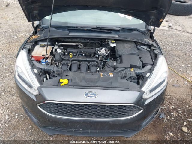 Photo 9 VIN: 1FADP3E24JL220482 - FORD FOCUS 