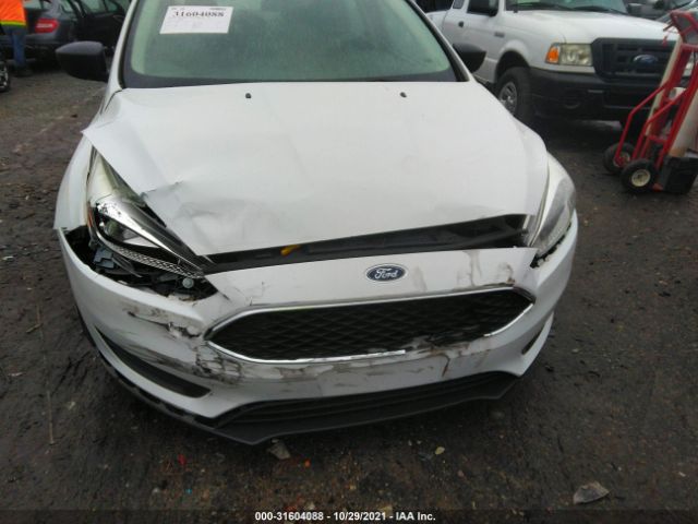 Photo 5 VIN: 1FADP3E24JL297451 - FORD FOCUS 