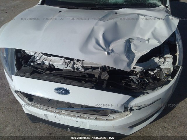 Photo 5 VIN: 1FADP3E25GL363238 - FORD FOCUS 