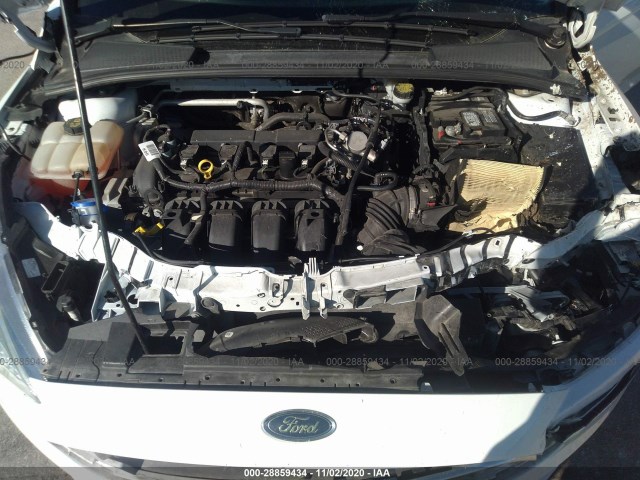 Photo 9 VIN: 1FADP3E25GL363238 - FORD FOCUS 