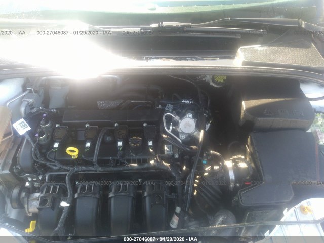 Photo 9 VIN: 1FADP3E25GL374255 - FORD FOCUS 