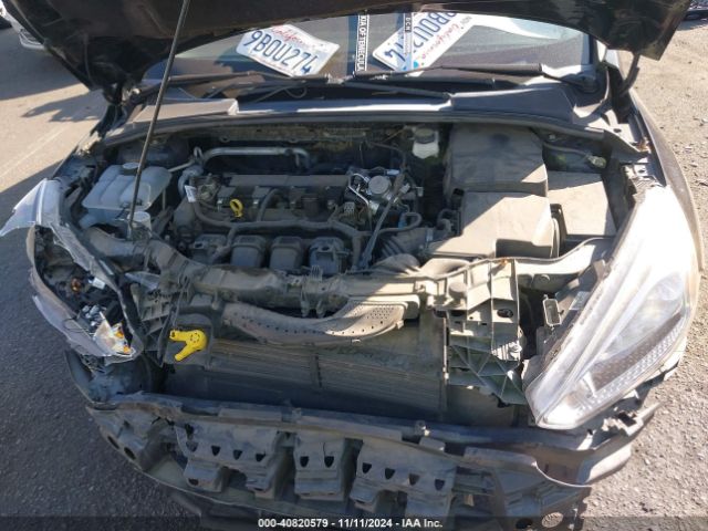 Photo 9 VIN: 1FADP3E25JL303998 - FORD FOCUS 