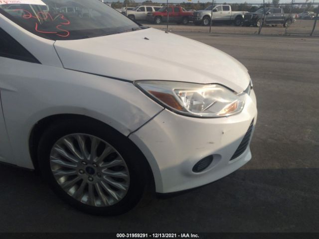 Photo 5 VIN: 1FADP3E26DL118573 - FORD FOCUS 