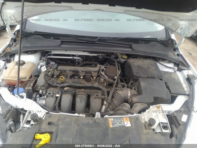 Photo 9 VIN: 1FADP3E26GL262385 - FORD FOCUS 