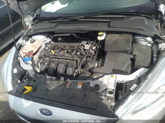 Photo 9 VIN: 1FADP3E26JL208110 - FORD FOCUS 